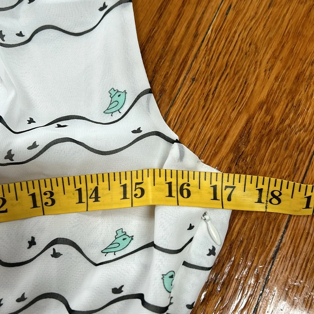 Forever 21 sleeveless dress.  Cute bird print. Size Small. Pleated skirt. - Picture 7 of 14